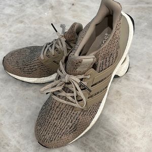 Ultra boost Adidas. Tan with black and white accents. Great condition.